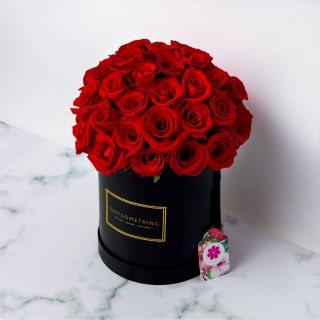 Roses in Black Round Flower Box