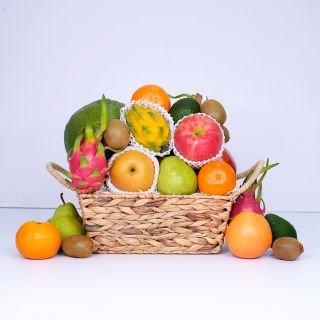 Traditional basket with fresh seasonal fruits